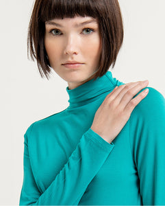 SURKANA <BR>
Fitted T-shirt with plain elasticated low Perkins polo neck<BR>
Black or Turquoise <BR>