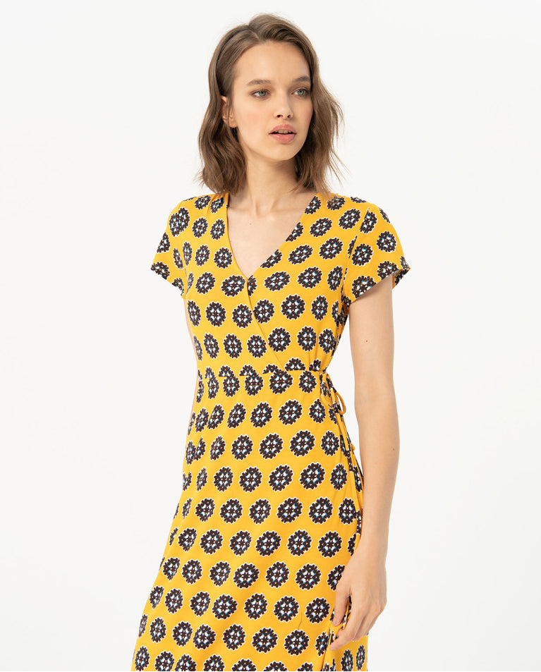 SURKANA <BR>
Printed midi cross over dress <BR>
Yellow <BR>