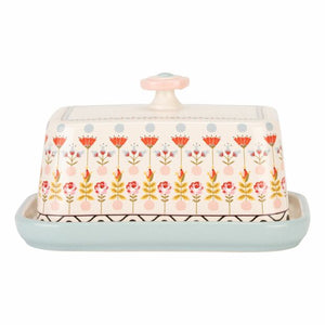 Block butter is best served on its very own dish! This painted table covered butter dish from Cath K