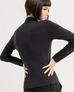 SURKANA <BR>
Fitted T-shirt with plain elasticated low Perkins polo neck<BR>
Black or Turquoise <BR>