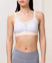 Load image into Gallery viewer, TRIUMPH &lt;BR&gt;
Unpadded Triaction Extreme Lite Sports Bra &lt;BR&gt;
White with peach trim &lt;BR&gt;
