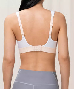 TRIUMPH <BR>
Unpadded Triaction Extreme Lite Sports Bra <BR>
White with peach trim <BR>